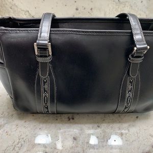 Versace black leather handbag with with logo stitching.